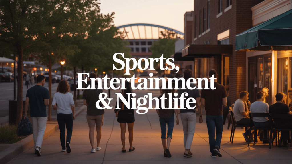 People walking along a lively Denver street at dusk near restaurants and venues, representing nightlife and entertainment culture.