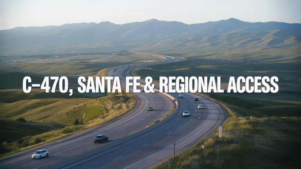Aerial view of C-470 highway with vehicles, surrounded by lush green hills and mountains in the background, labeled 'C-470, Santa Fe & Regional Access'.